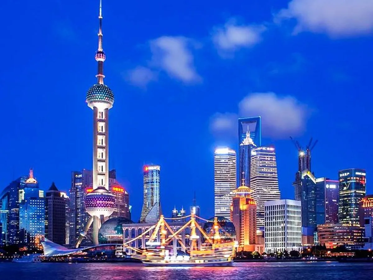 Shanghai Night River Cruise Tour with Xinjiang Style Dining Experience